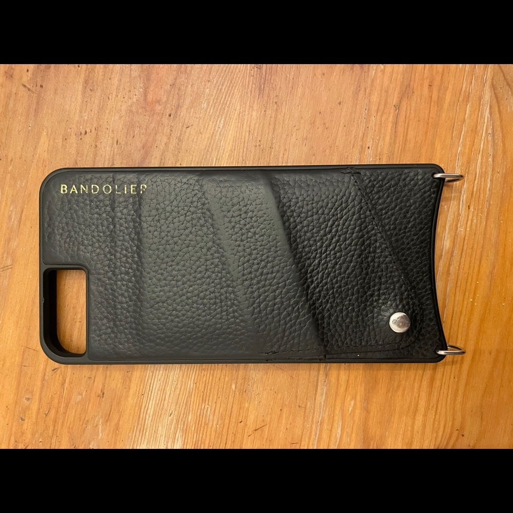 Bandolier phone case with pocket and strap